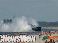 Russian Navy Hovercraft Lands On Busy Beach