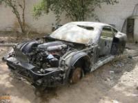 Zniszczone samochody syna Hussaina