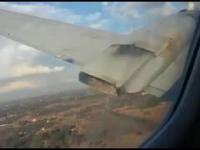 Wypadek lotniczy - ujęcie z wnętrza samolotu. Silnik płonie, samolot spada.
