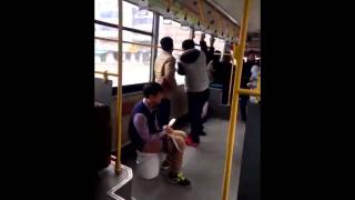 Man sits and shits on bus 